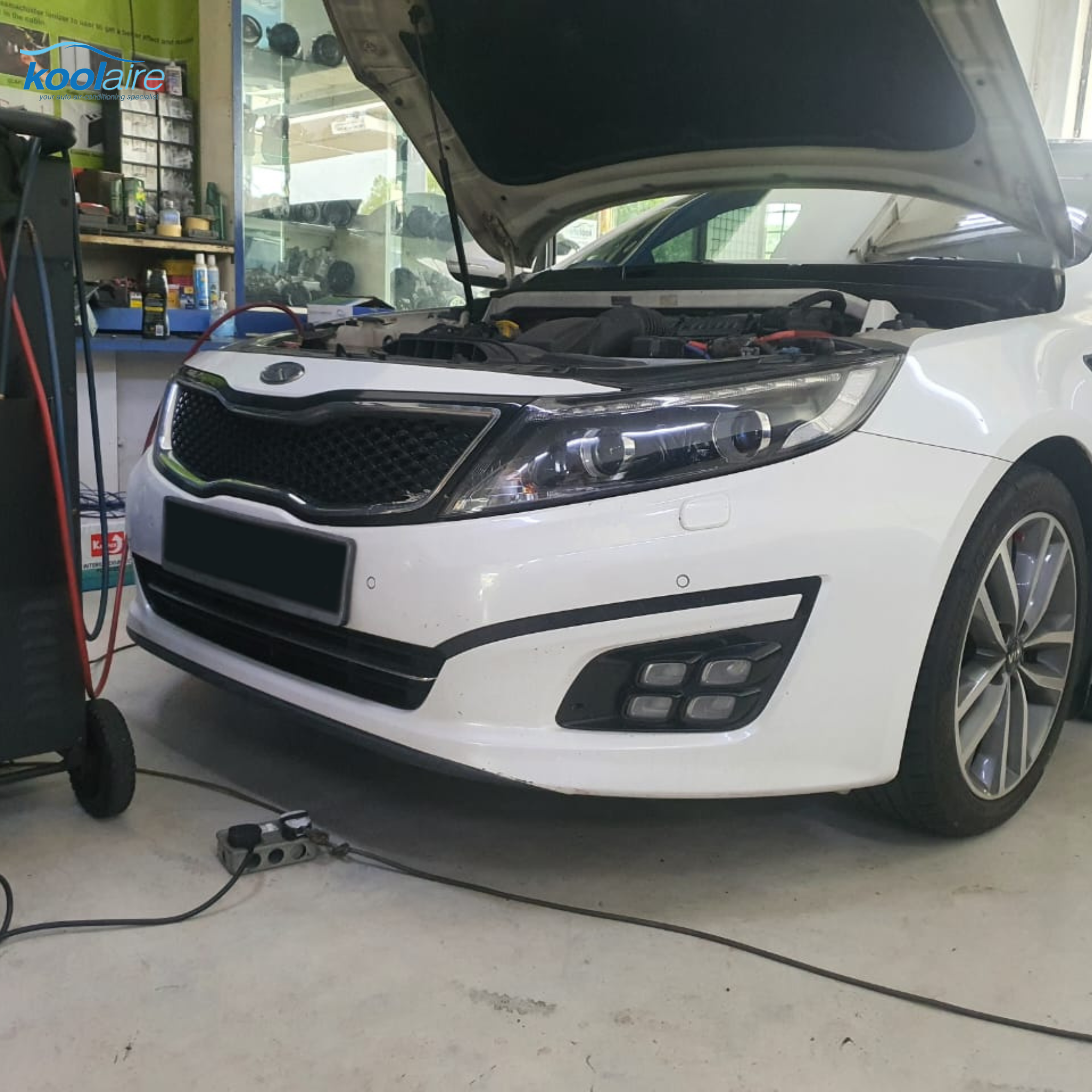 Kia receiving aircond service at Kool Aire